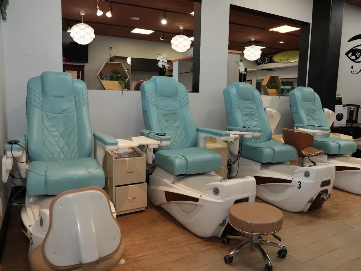 Our teal pedicure chairs.