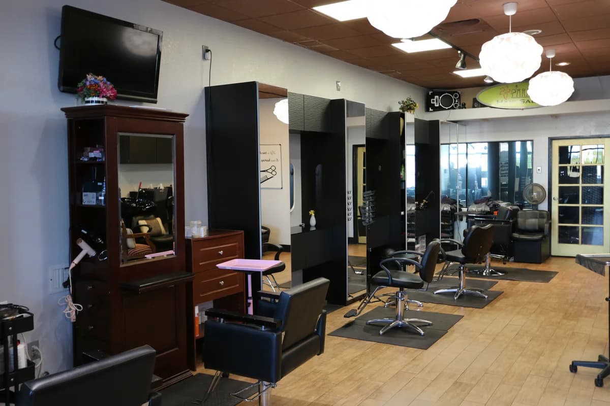 Hair styling stations with mirrors.