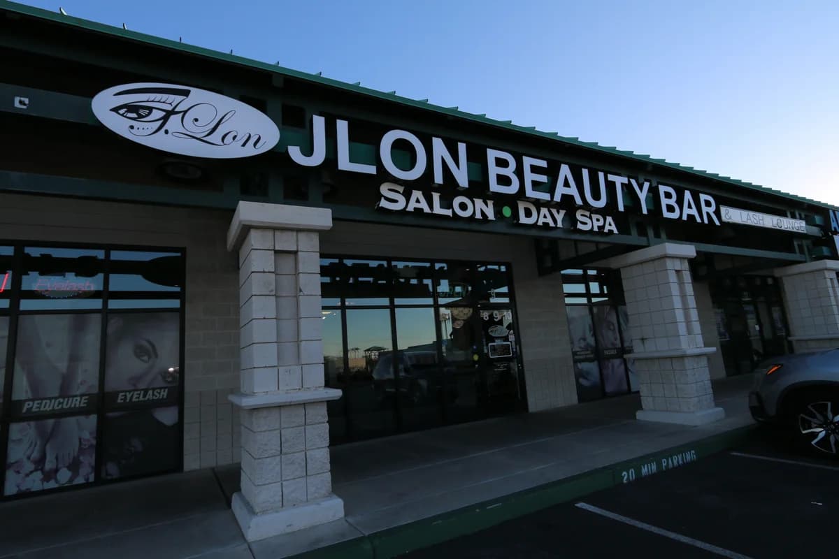 JLon Beauty Bar storefront at sunset.